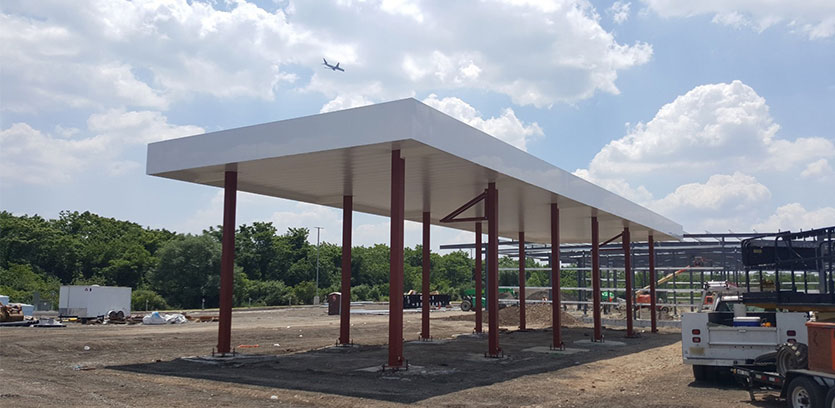 Raising the height of your service station's canopy is often less expensive long term than repeatedly repairing damage caused by collisions with tall vehicles.